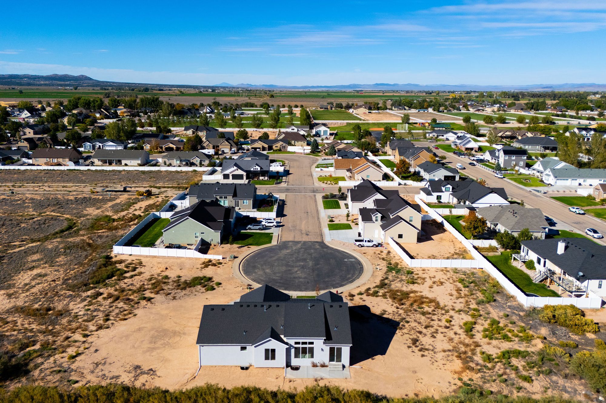 Aerial view of Equestrian Pointe showing the cul-de-sac, finished homes and open land for the coming phases
